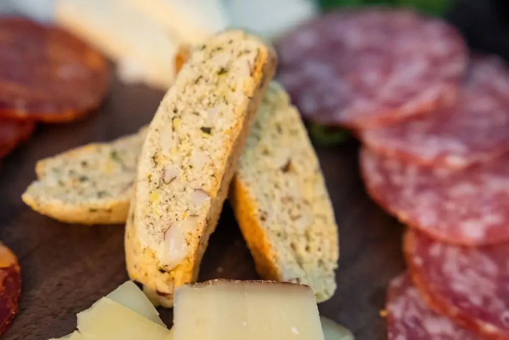 A close up of cheese and crackers on a plate