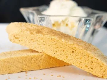 A close up of two pieces of cake