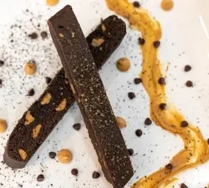 A close up of two pieces of chocolate