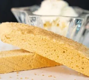 A close up of two pieces of cake