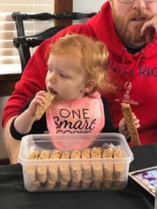 Family taste-testing biscotti during winter flavor development at G. G. Biscotti Co.