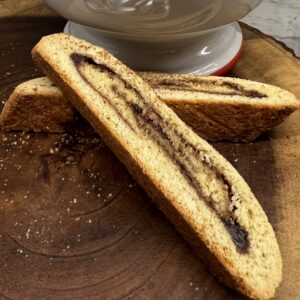 Close up of Cinnamon Roll Artisan Biscotti showing cinnamon swirled in buttery biscotti.